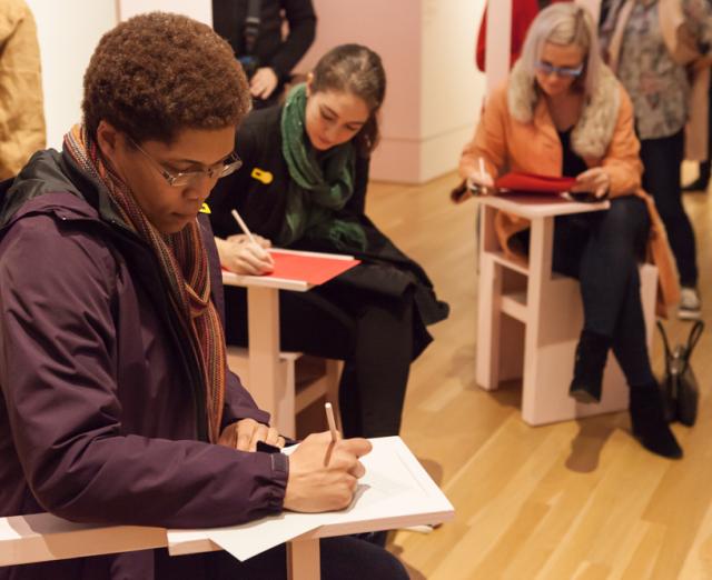 Visitors writing letters